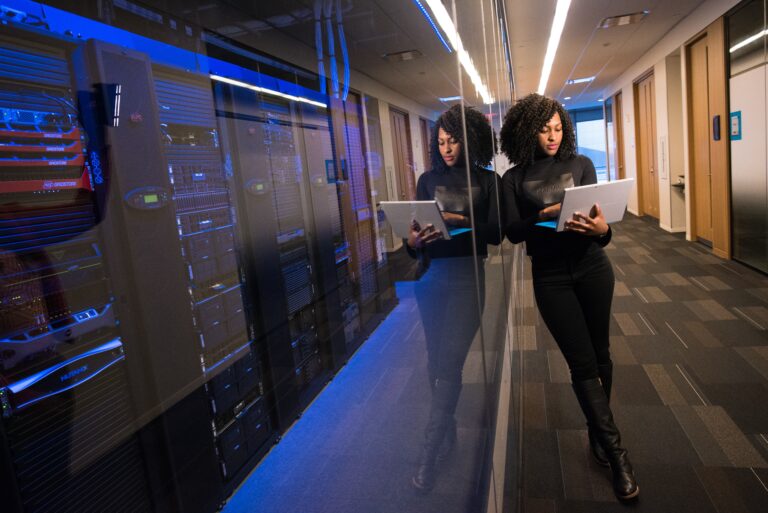 A woman uses on-premise monitoring for her data center.